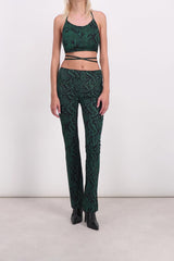 Green snake print slim straight leg pants