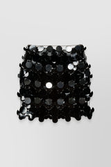 Sparkle mini skirt with circular mirror-effect discs