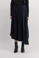 Asymmetric pleated crêpe skirt