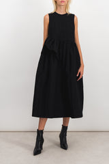 Sleeveless dress with ruffled detail on the side