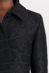 Fitted black coat with asymmetric side panels