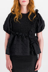 Blouse with smocked panels and ruffles